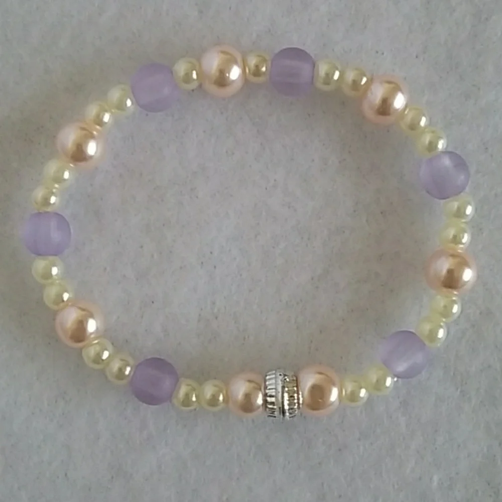 Girls pink and lavender beaded bracelet